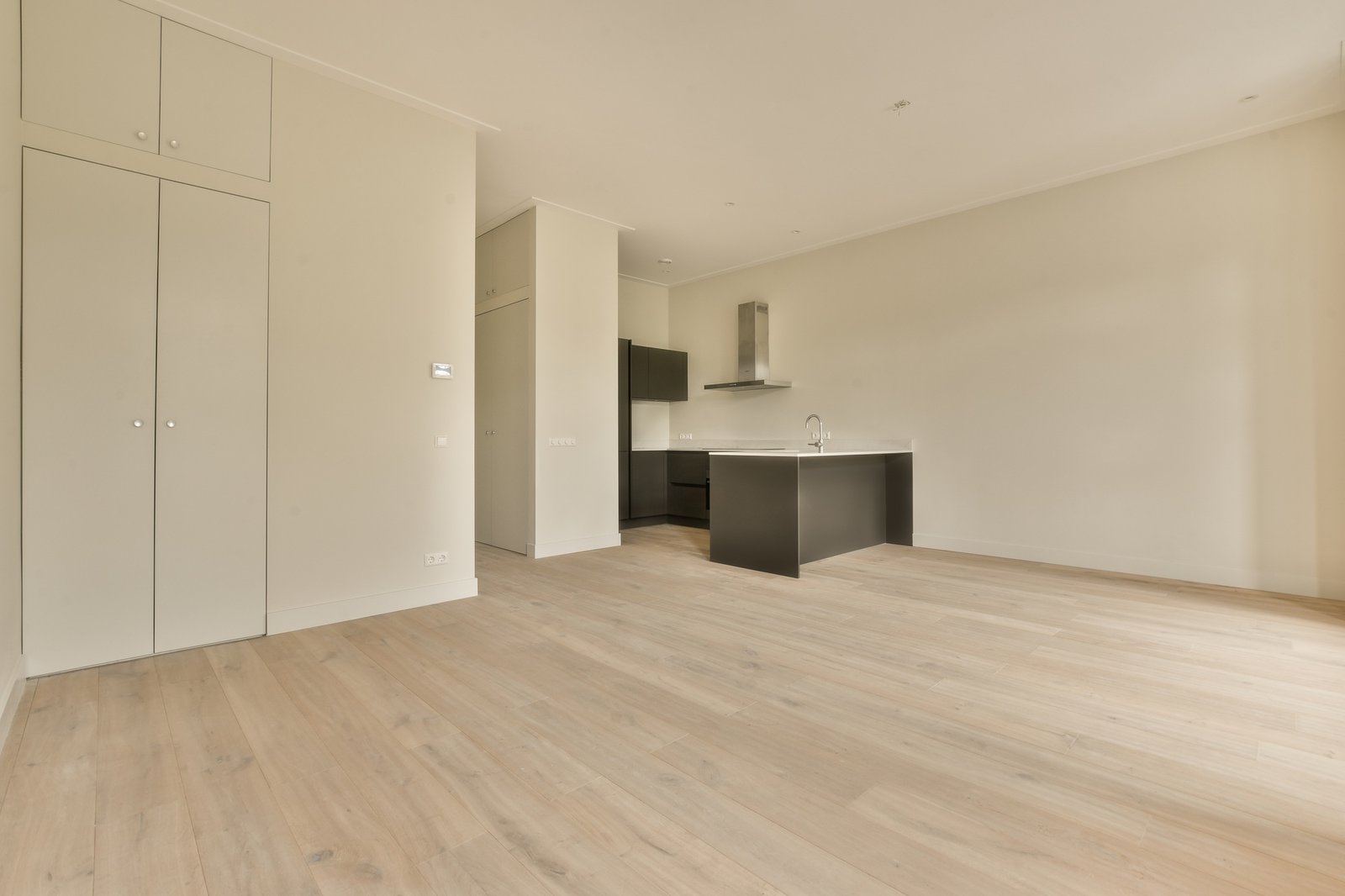 a renovated living room and kitchen in a new house